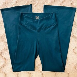 PAC 1980 crossover flare leggings in a rich deep teal/blue-green